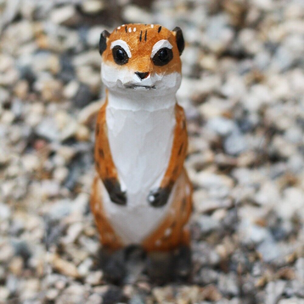 Handmade Meerkat wooden figurine, detailed collectible sculpture for home decor.
