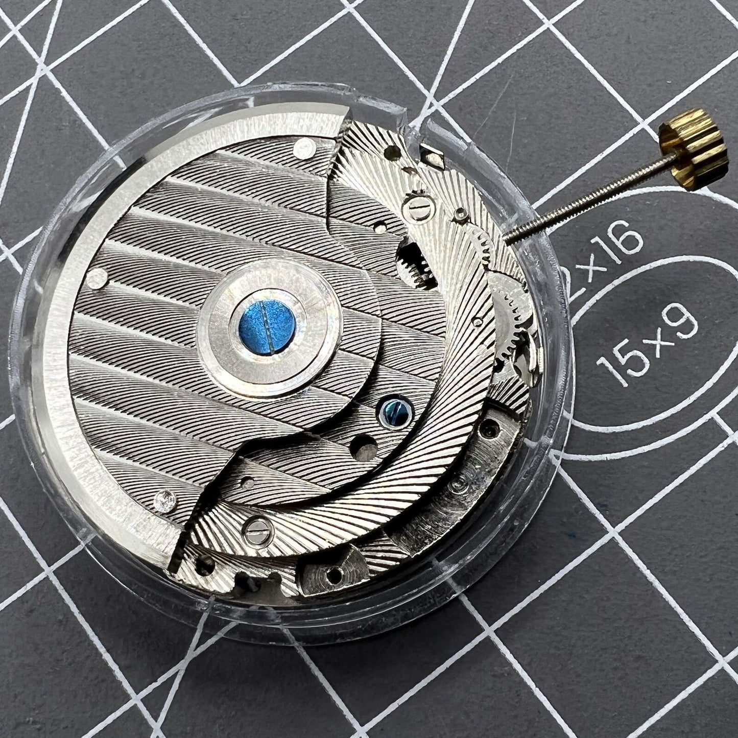 Automatic mechanical watch, reversed balance wheel, big date at 12, precision timepiece.