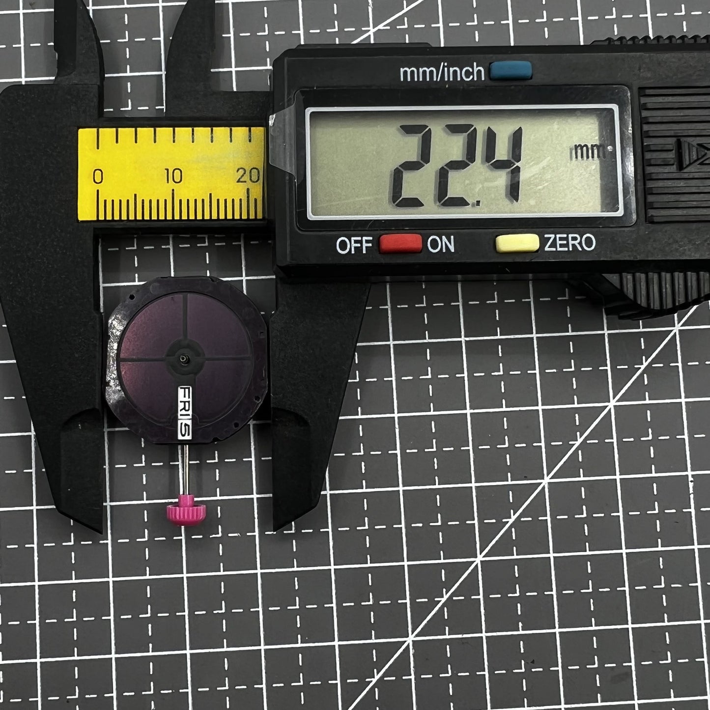 Citizen E101M Eco-Drive watch with Japan movement, date window at 3 o'clock, sleek black dial.