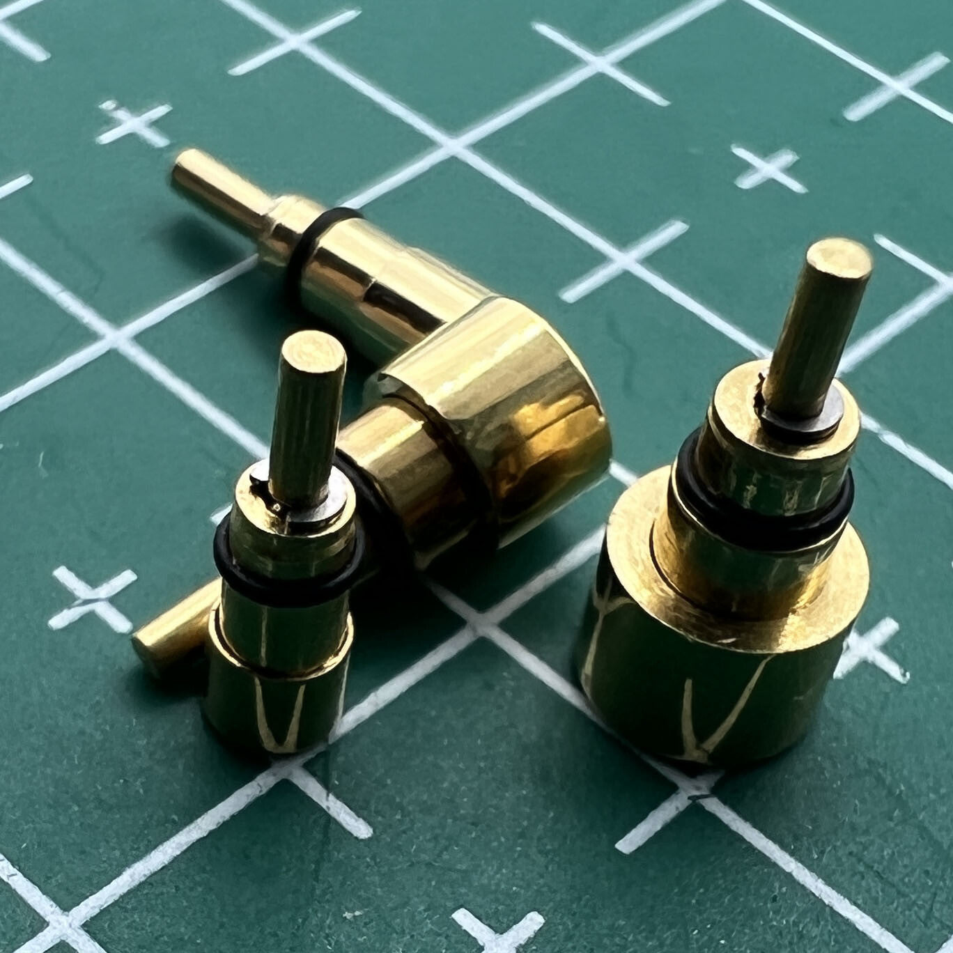 Golden stainless steel watch accessory with classical pusher drive design by Wholesale Watch, available in 13 sizes.