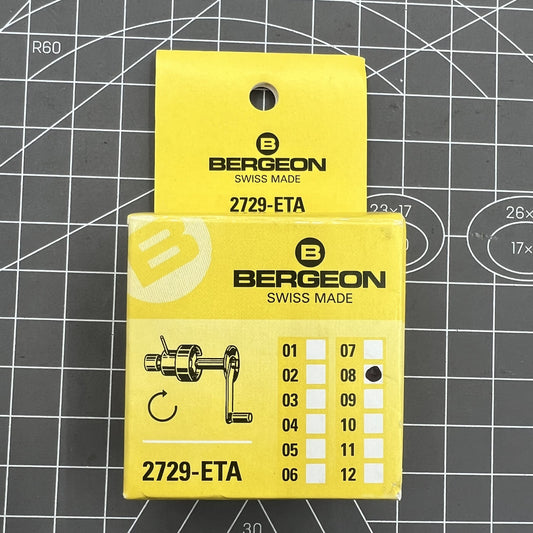 Swiss Bergeon 2729-ETA watch mainspring winder with spare barrels for ETA calibres, precision tool accessory.