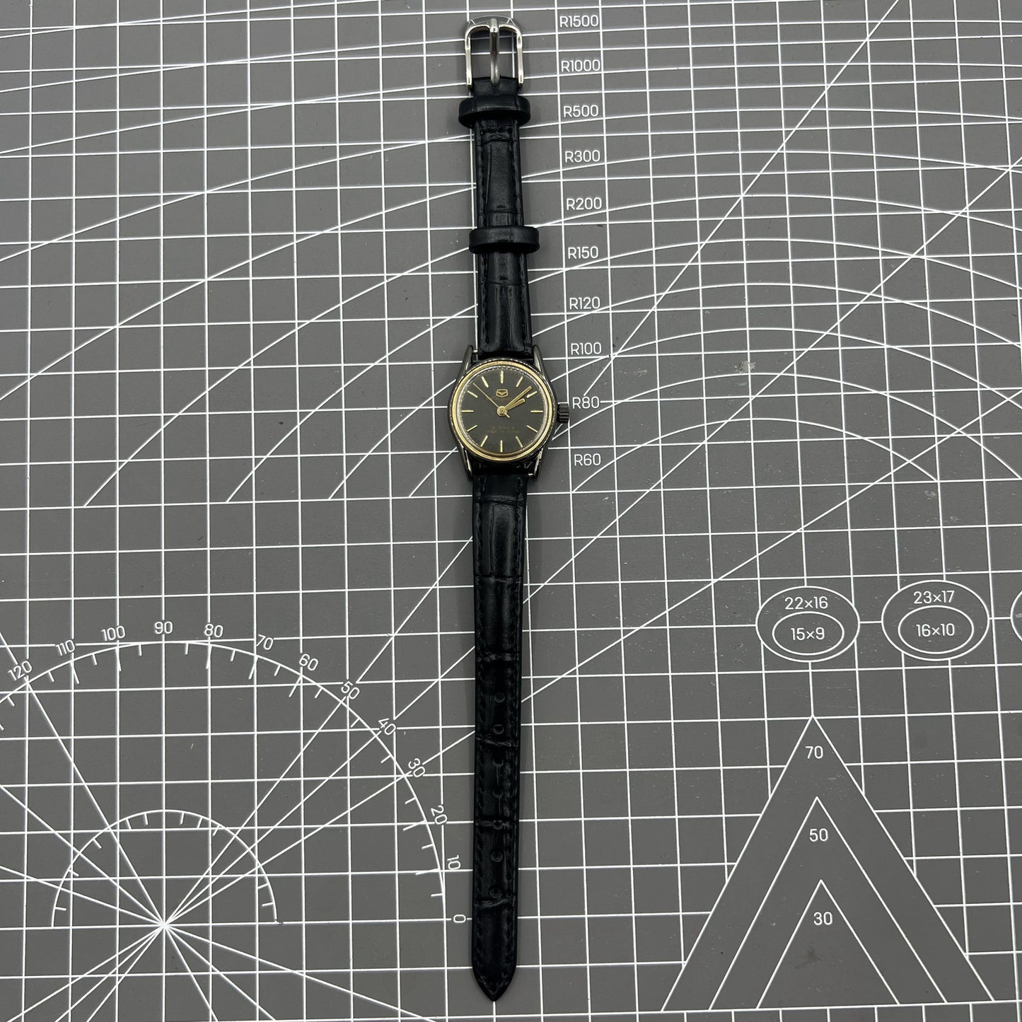 Black case ladies Seagull manual mechanical watch with golden nail markers, shock-resistant design for durability.