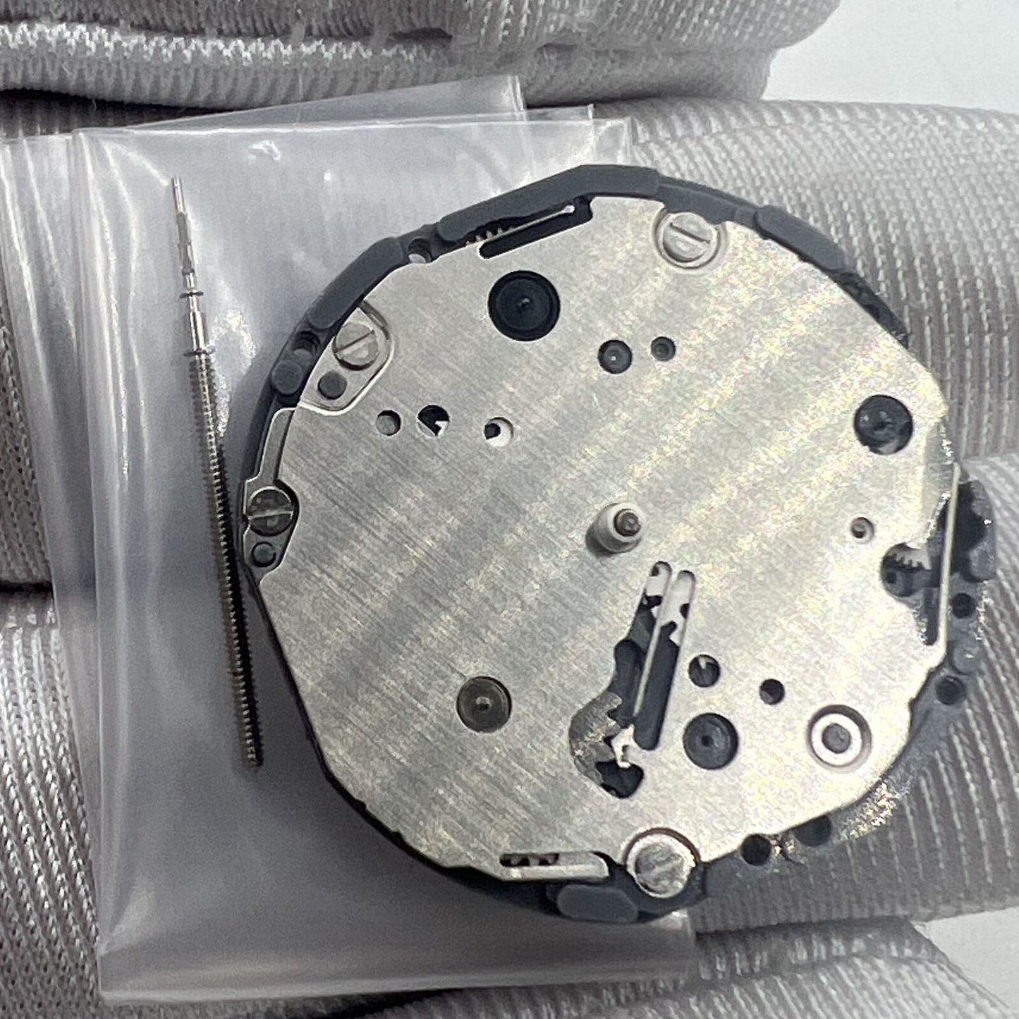 Japan Made Hattori Epson TMI VD87 quartz watch movement showing precise internal components and craftsmanship.