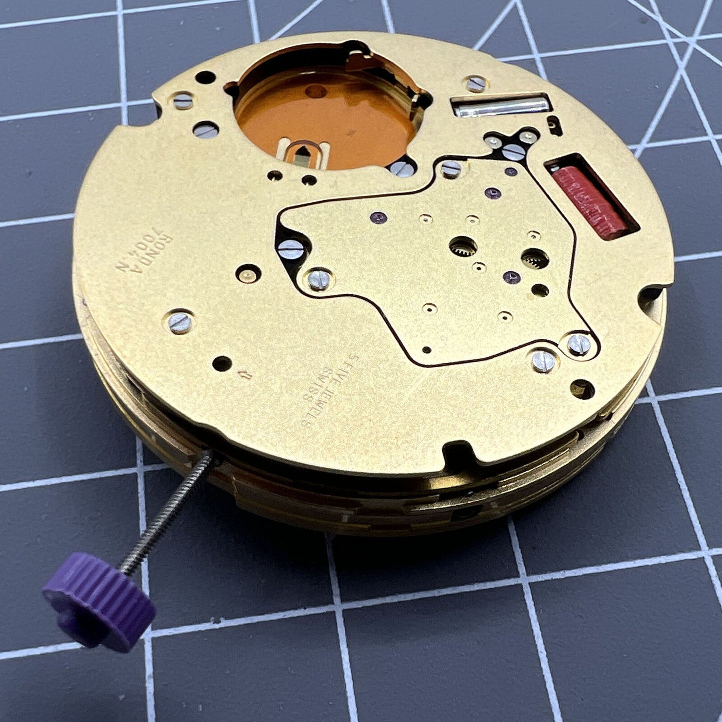 Swiss Made Ronda 7004N quartz watch movement, precise and reliable for quality watch accessories.