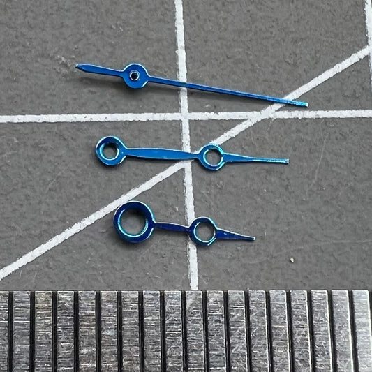 Blue 13mm hollow watch hands with no lume, compatible with Miyota 2035 quartz movement, precision design.