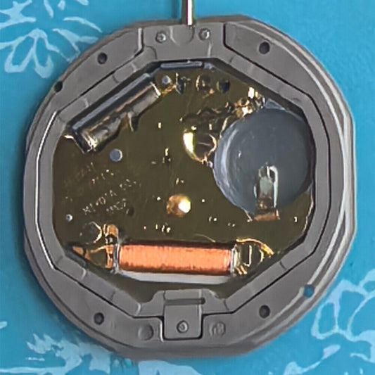 Miyota 1M02 quartz movement watch with black dial, red accents, double calendar display, sleek design.