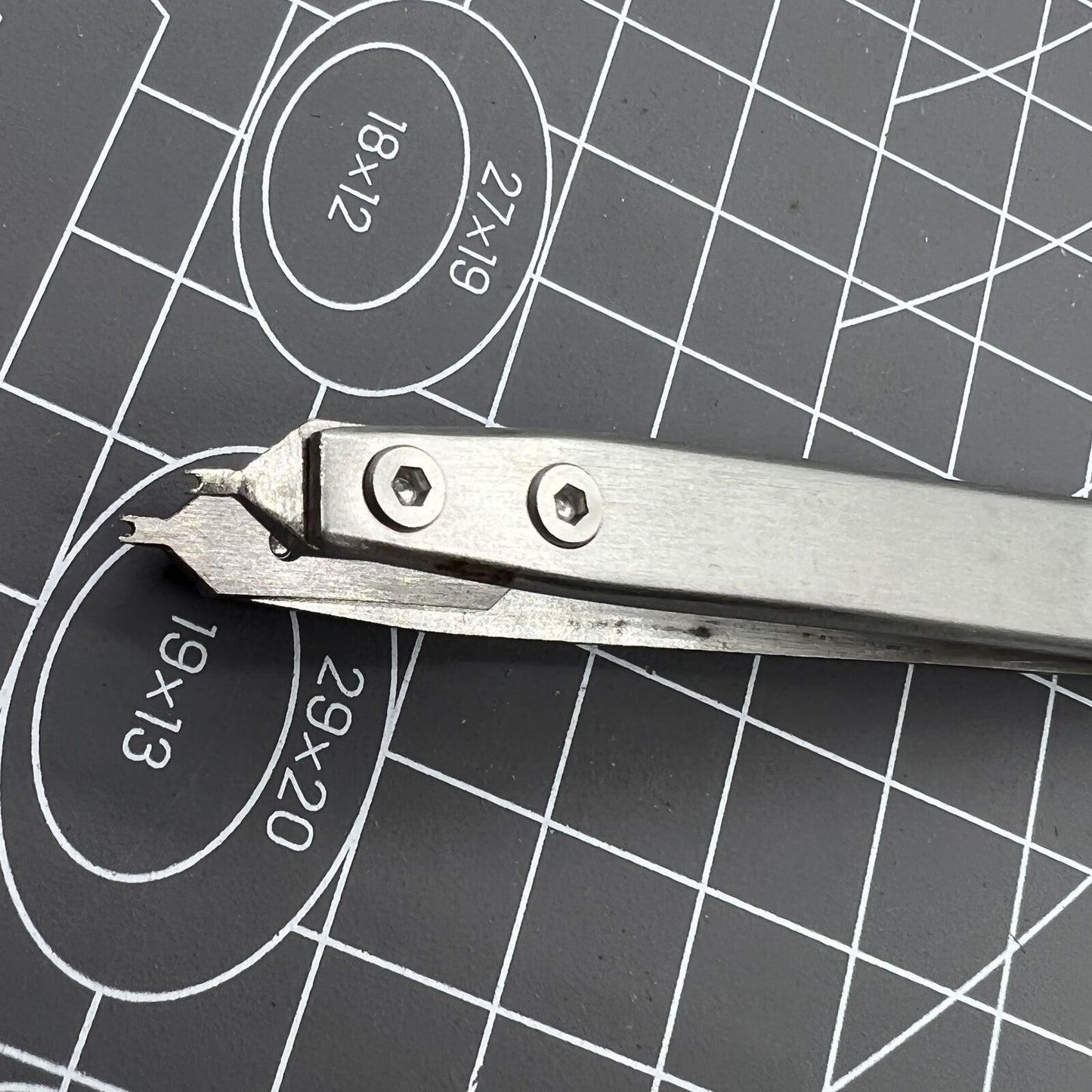 Bergeon 7825 spring bar tweezer tool for precise watch lug spring bar removal and fitting.