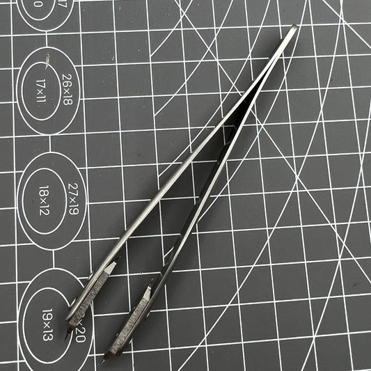 Spring bar tweezer tool by Bergeon 7825 for precise watch lug spring bar removal and fitting.