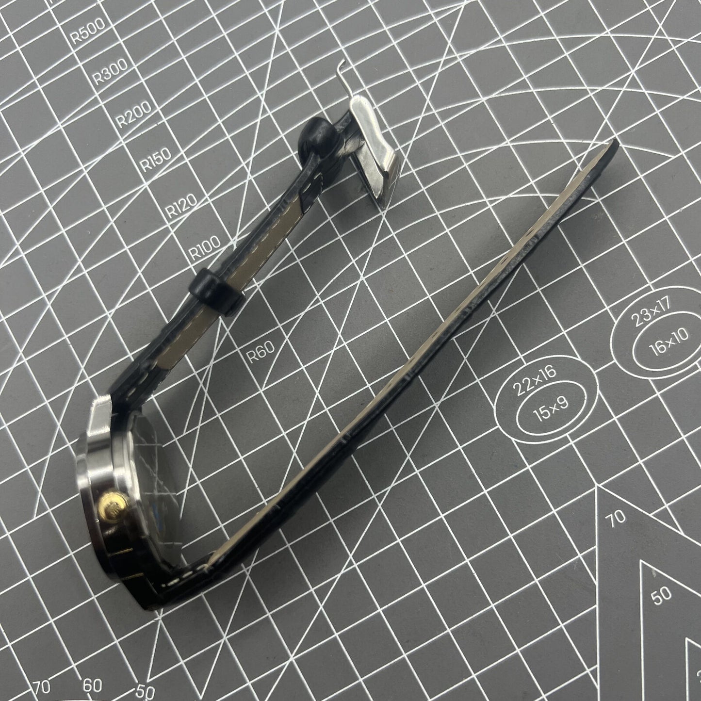 Shanghai Factory 34mm manual mechanical watch with black dial, 19 jewels, shock-resistant for daily wear.