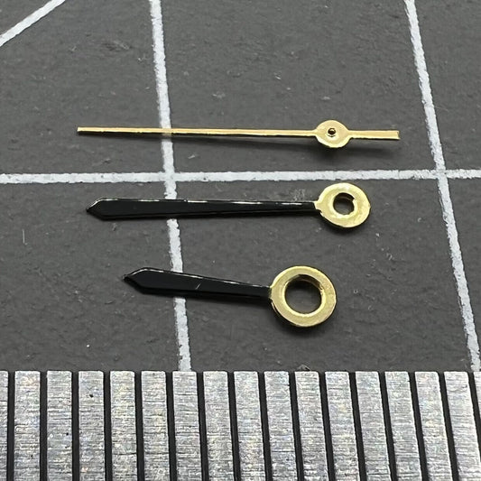 Arrow-shaped watch hands for Ronda 763 quartz movement, compatible with various watch models.