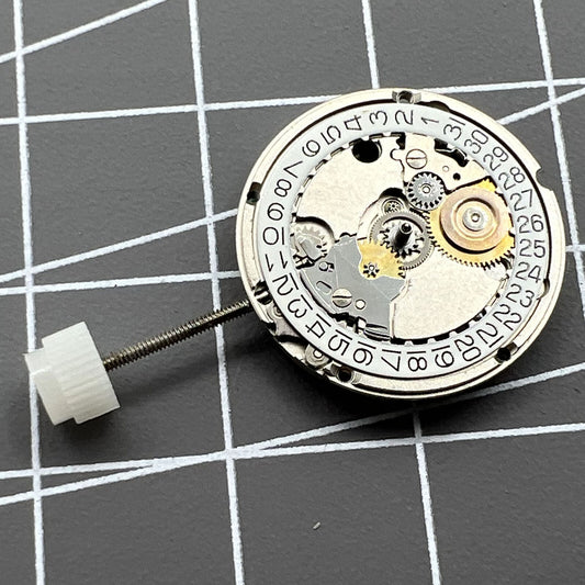 ETA556.115 Swiss quartz watch movement showing 3 hands and date window at 3 o?clock.