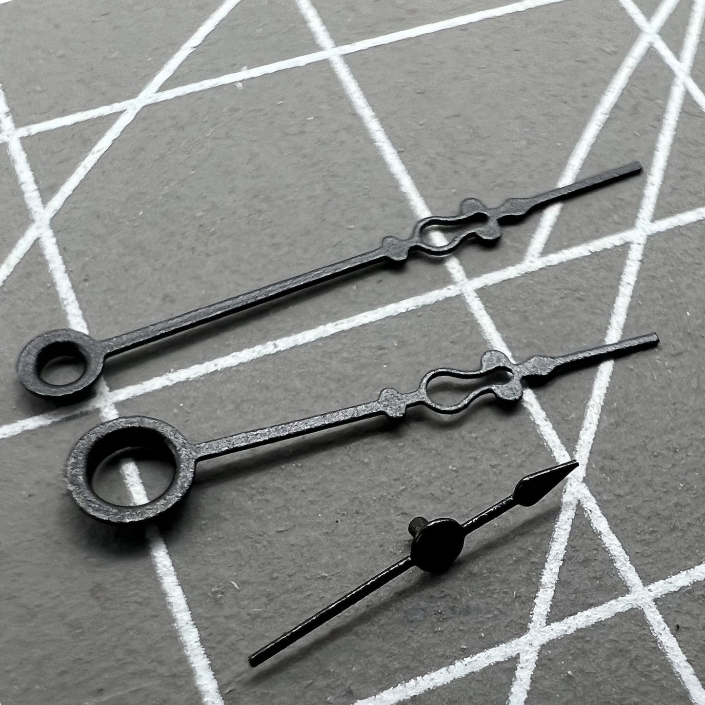 Small black floral watch hands by Seagull, designed for ST3600/ST3621 and ETA6497/6498 movements, elegant accessory.
