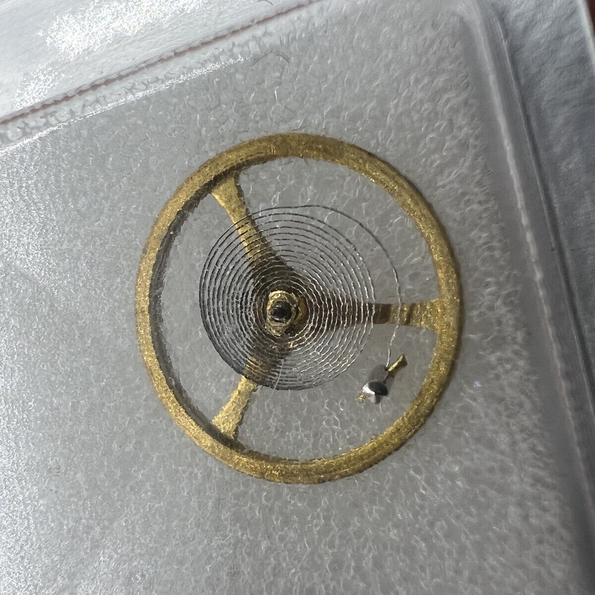 Silver and gold skeleton watch part with 2189 balance wheel, China-made replacement for accessories.