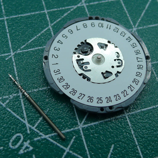 Hattori Epson TMI VJ34 quartz watch movement with date at 6, Japan-made precision component.
