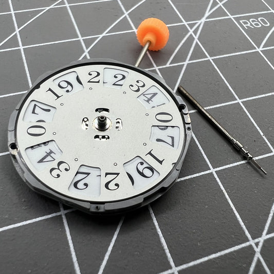 Japan Miyota 1M52 quartz watch movement with 3 hands and date display at 12 o'clock by Miyota.