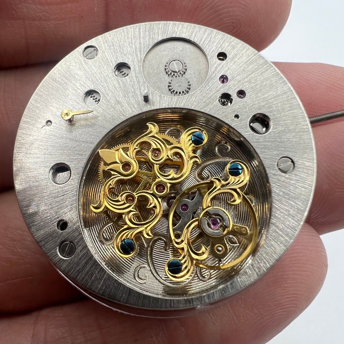 Multifunctional automatic watch, featuring mechanical movement and kinetic tourbillon for precise timekeeping.