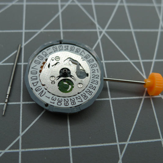 Miyota 1L12 Japan quartz watch movement with date display at 3 o?clock, precision timekeeping by Miyota.