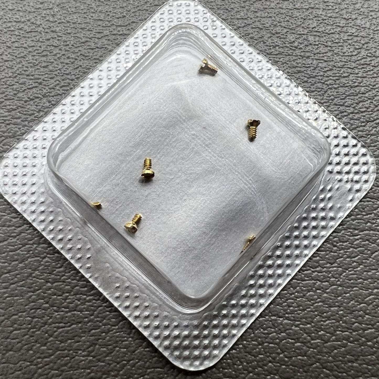 Set of 0.7mm golden back cover screws for La Grande Classique De Longines L4 watch repairs and maintenance