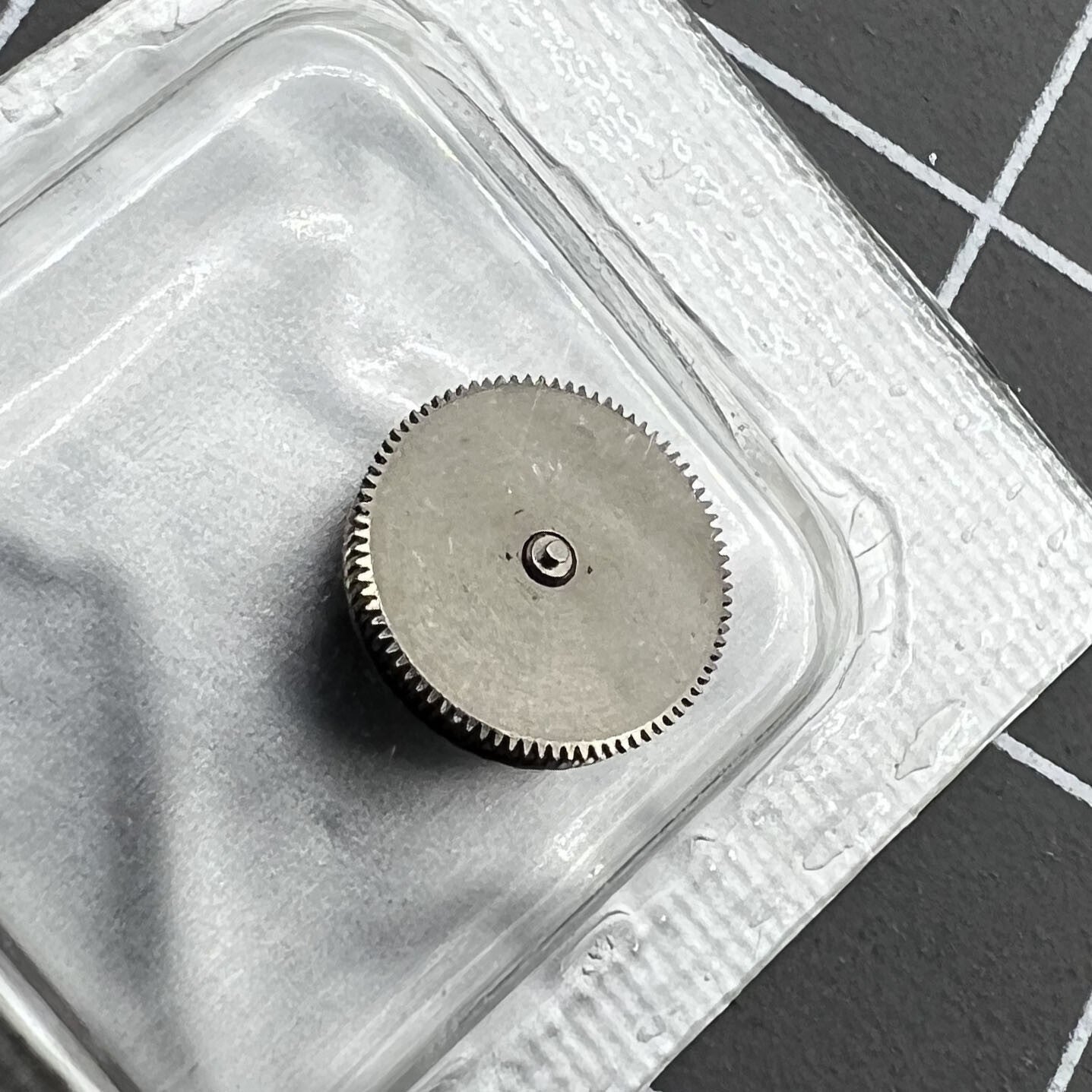 Complete barrel with new mainspring for NH05 NH06 movement, improving accuracy in generic watch repairs.