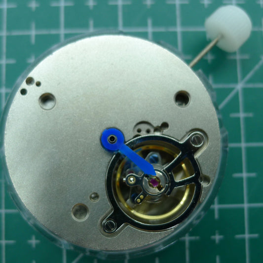Wholesale Man Shanghai watch accessory showcasing automatic mechanical movement with hollow balance wheel at 6 o'clock.