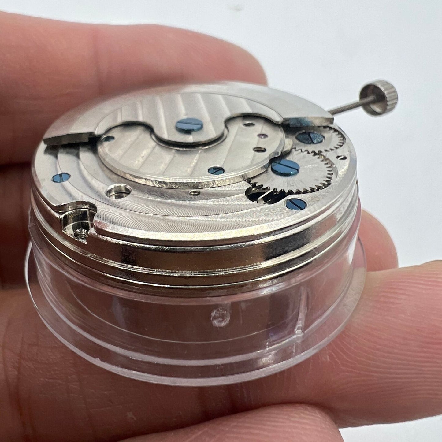 Multifunctional automatic watch featuring mechanical movement and kinetic tourbillon mechanism.