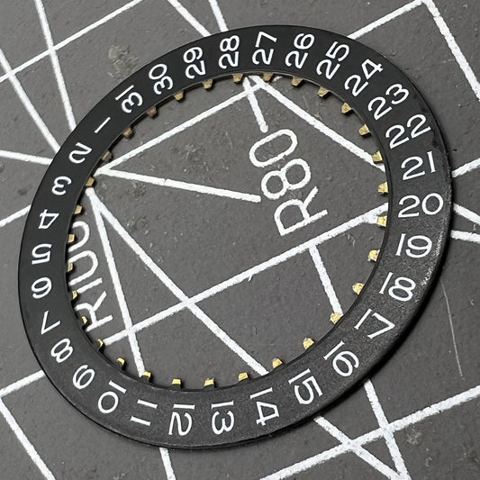 Black date wheel disk for ETA2824 movement with date display at 3 o'clock position.