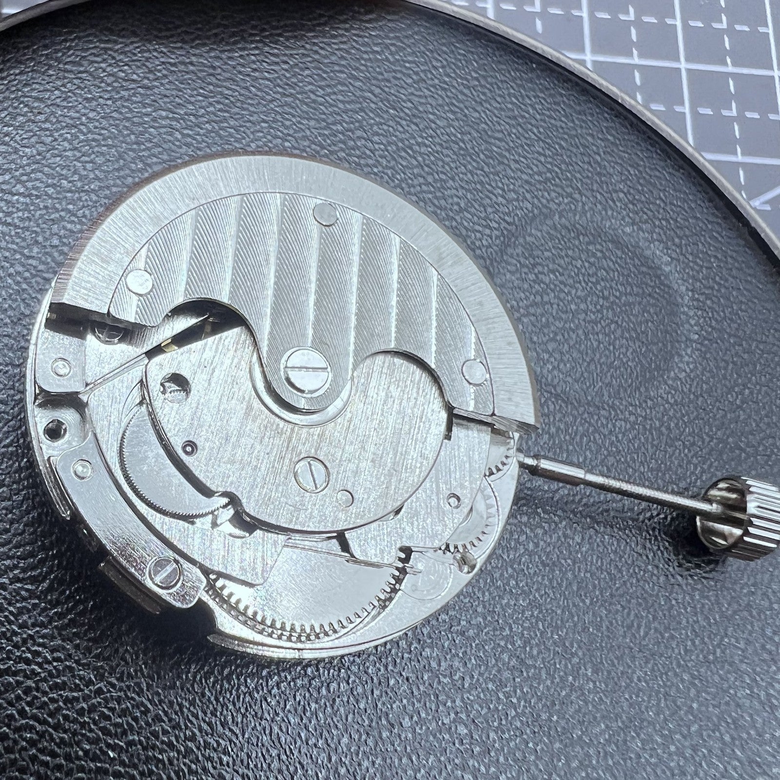 Tianjin ST16 silver watch showcasing hollow automatic mechanical movement with elegant skeleton dial for collectors.