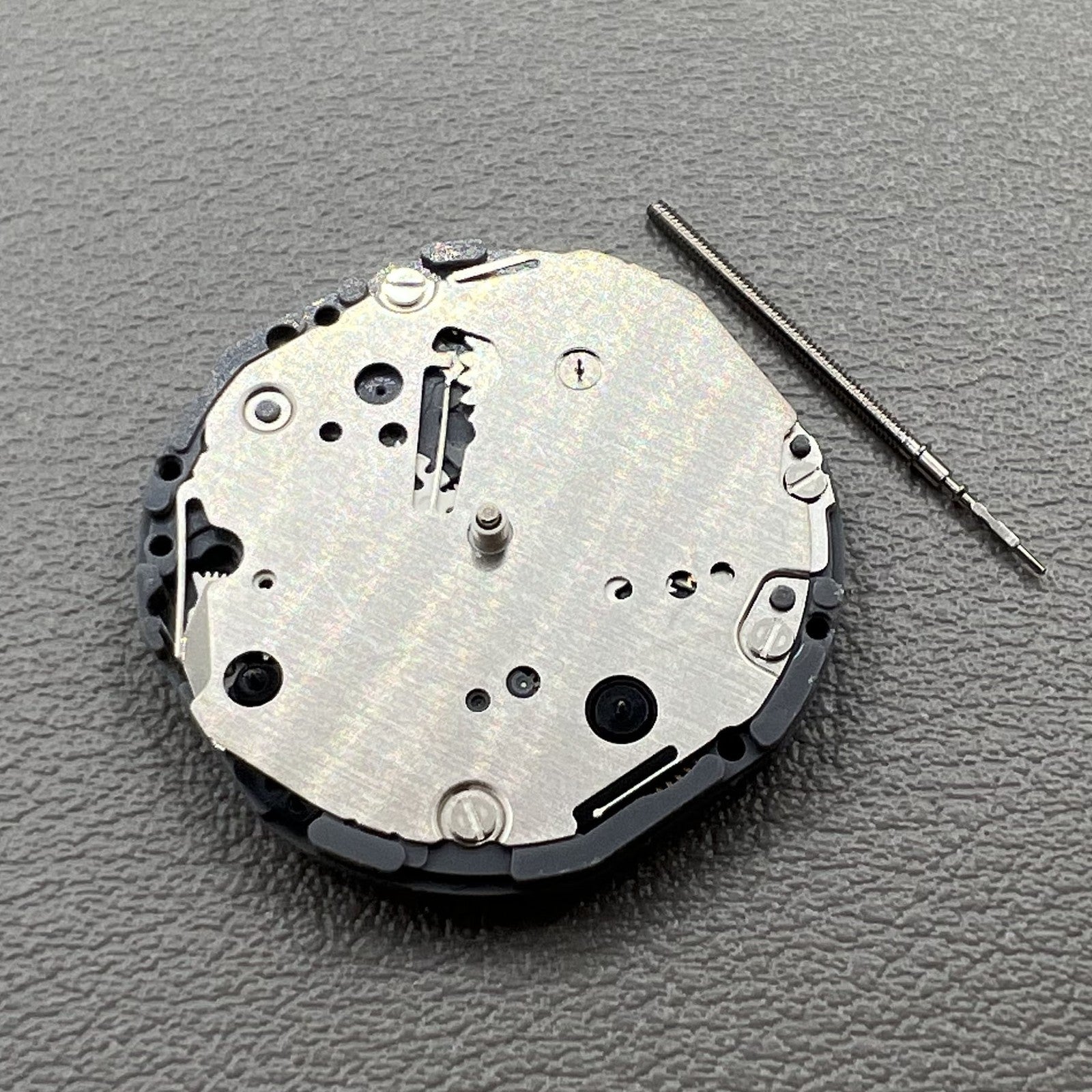 Japan Hattori Epson VD87A quartz watch movement showcasing precision craftsmanship and reliable timekeeping.