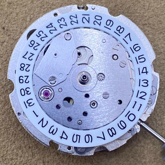 Japan Made Miyota 8217 automatic watch movement with 3 hands and small second at 9, precision craftsmanship.