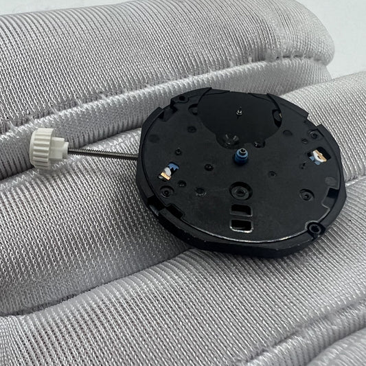 Sunon PE80 quartz watch movement with three hands and small second indicators at 3, 6, and 9 positions.