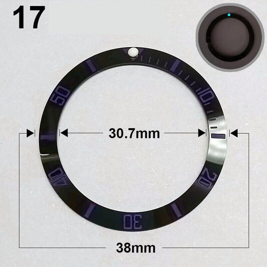 38mm ceramic watch bezel with black slope, purple font, and green luminous details.