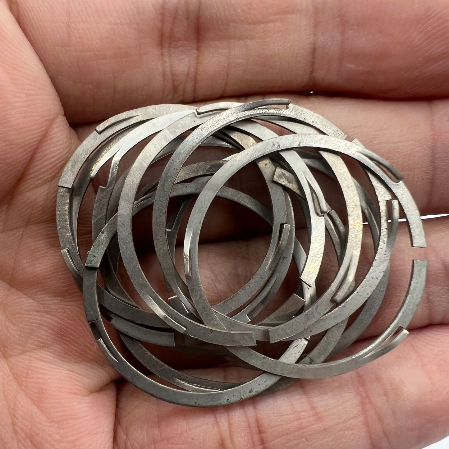 Steel cushion mount spacer ring for China Made 7120 watch movement, durable accessory.