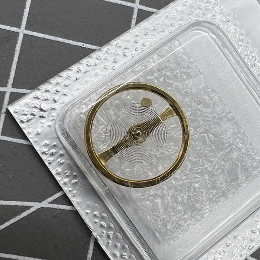 Golden balance wheel splint for Miyota NH38 NH39 watch movement, enhancing precision and style.