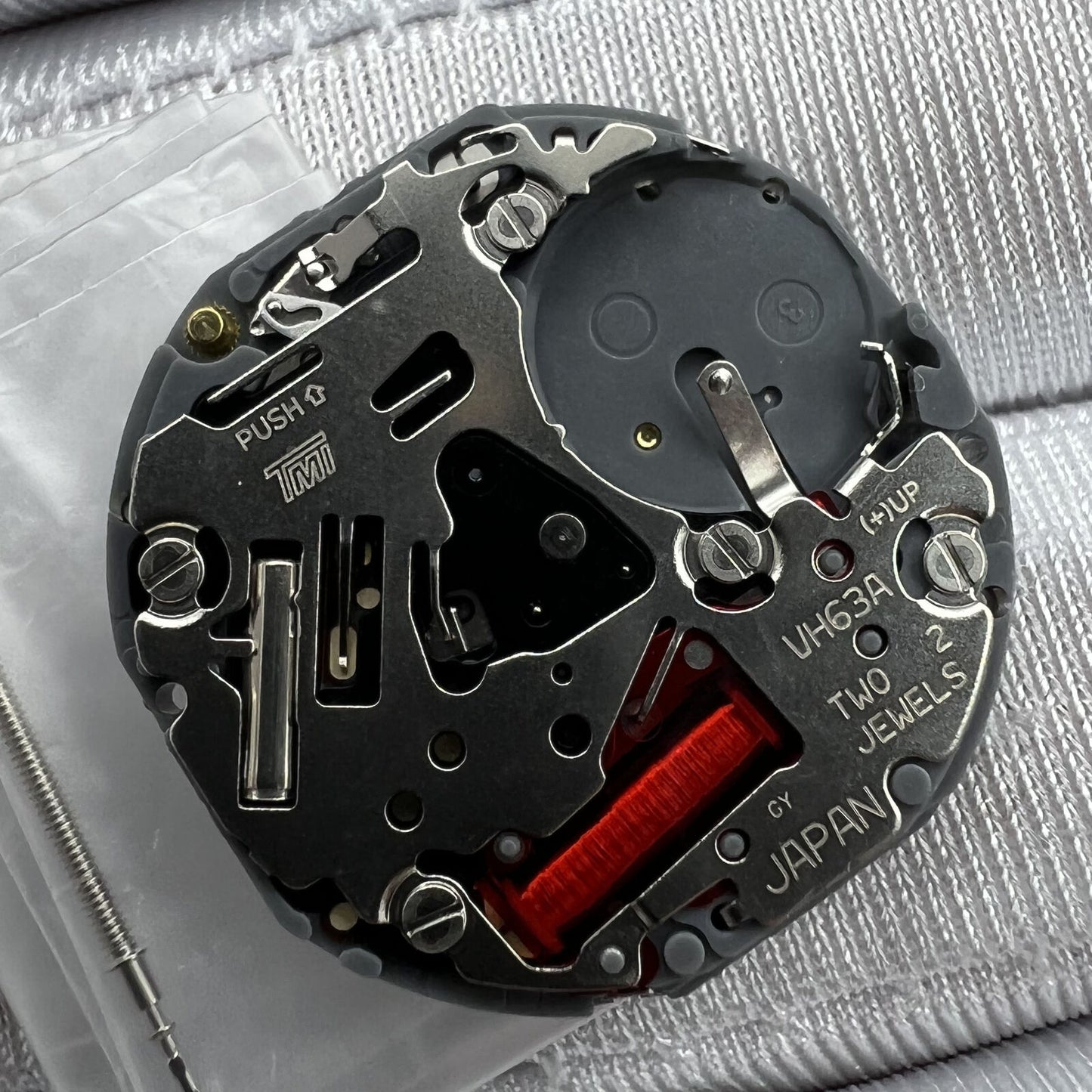 Hattori Epson TMI VH63 quartz watch movement with precise mechanical components for reliable timekeeping, Japan made.