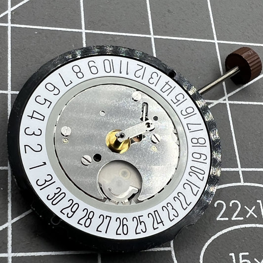 H2 Ronda 515 Quartz watch movement with date display at 6 o'clock, featuring high canon pinion for precise timekeeping.