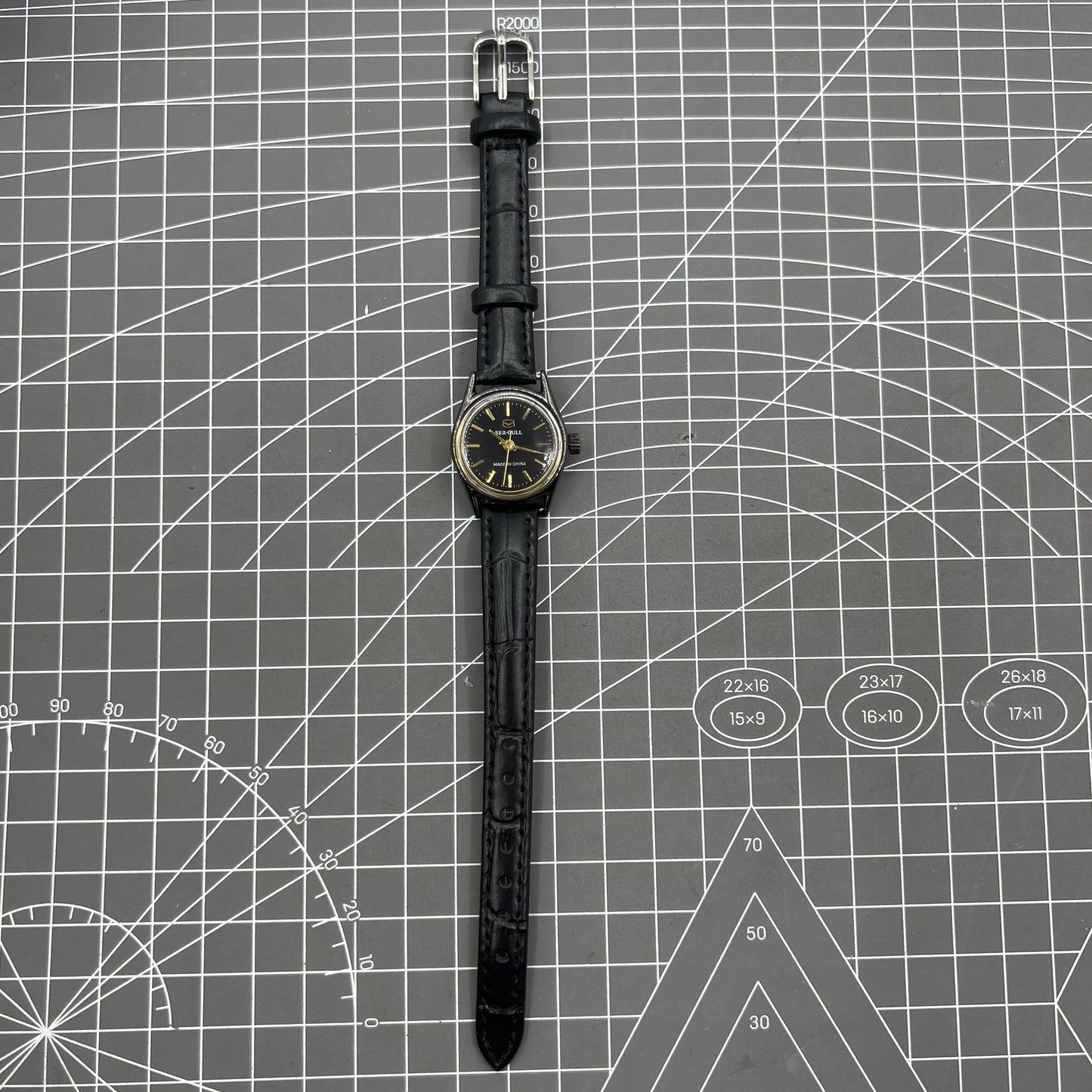 27mm Tianjin Seagull ladies watch with manual mechanical movement and golden nail markers.