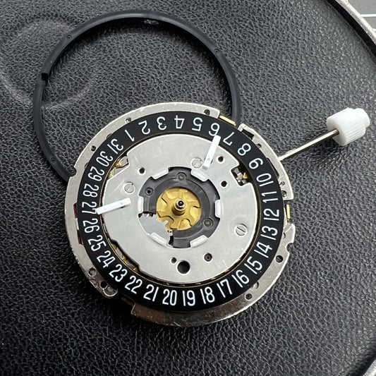 Golden watch accessory featuring ISA 8271 quartz movement with multifunctional date at 6,.