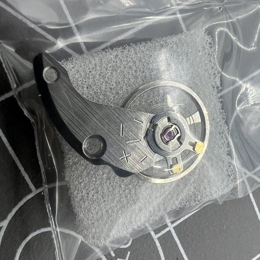 Silver watch balance wheel with splint, compatible with Miyota NH35 NH36 movement for precise timekeeping.