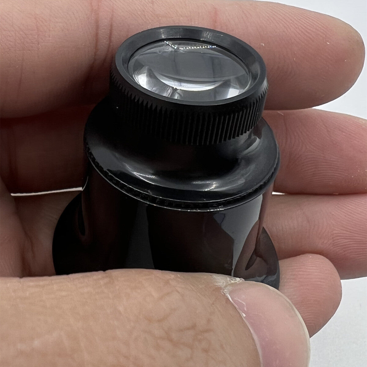 Bergeon 1458A-12 double lens eyeglass with 12x magnification for precise Swiss watch repairs.