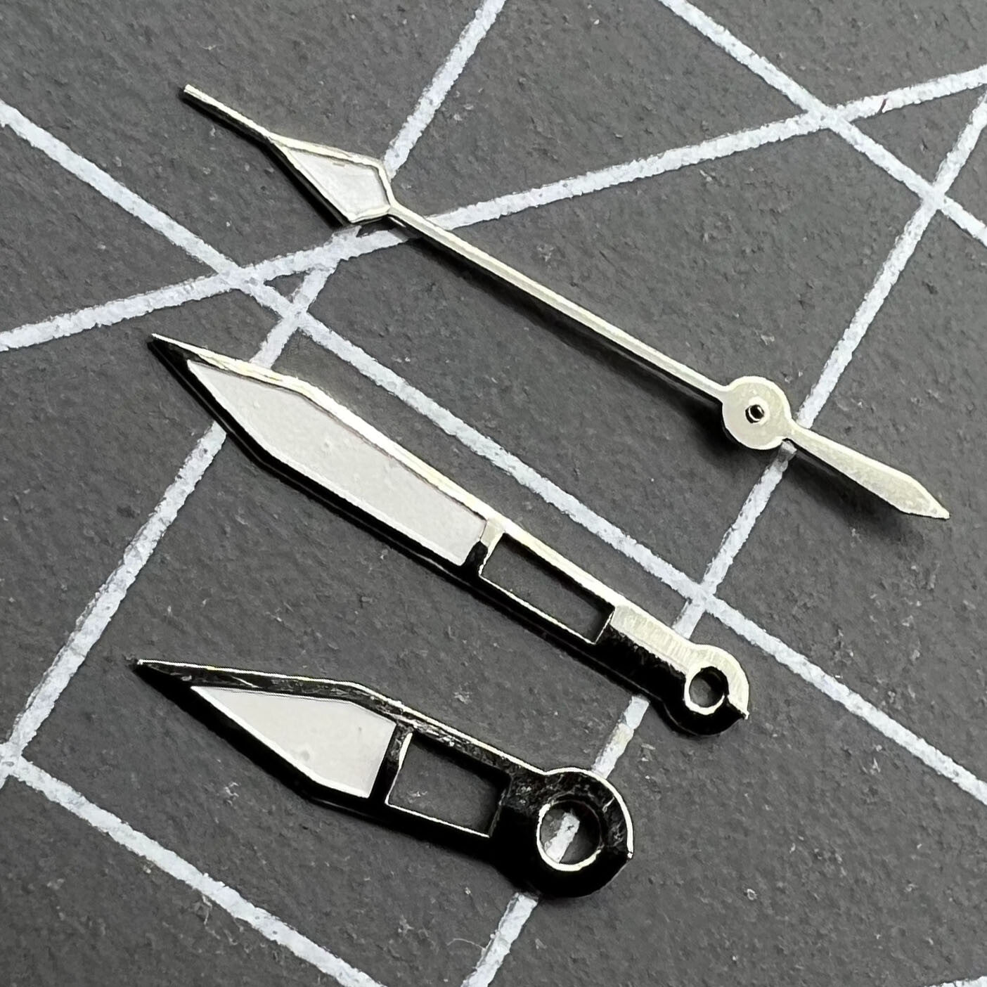 Lume arrow-shaped watch hands by P1-H2-C2 for Miyota 2035, glowing tips for accurate time reading.
