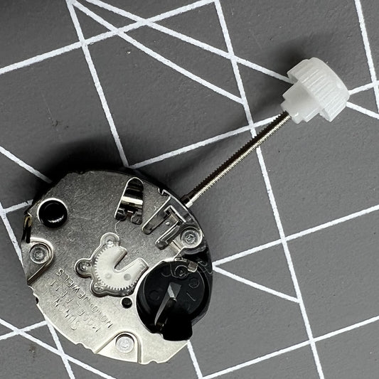 Quartz watch movement Sunon PE11 with 3 hands, precise timekeeping for watch repair and assembly.