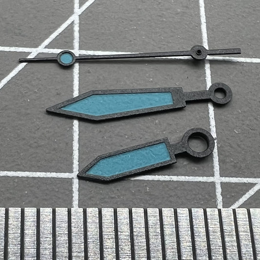 Blue luminous polished black trim watch hands for ETA2836/2846/2824/2846 movements, precise and sleek replacement parts.