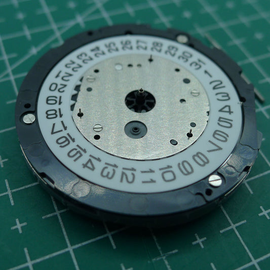 Miyota 6S30 quartz watch movement with date at 4, small seconds at 2, 6, and 10 - reliable precision by Miyota.