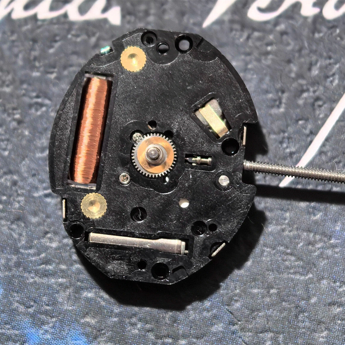 Japan-made TMI VC10E quartz watch movement with 2 hands, precision timekeeping part for watch repair.
