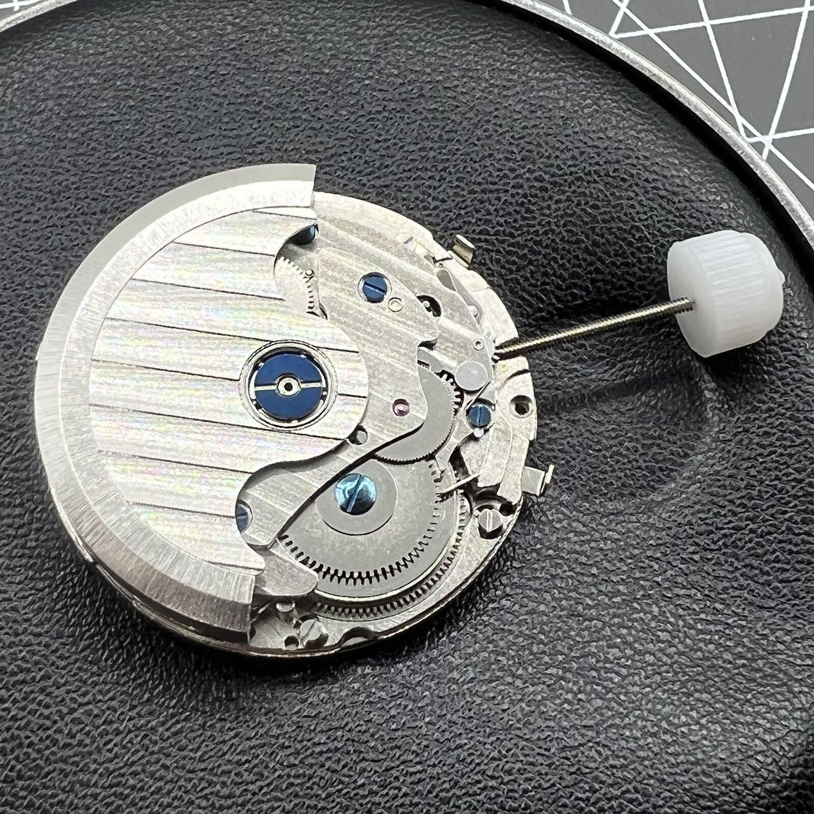 Shanghai JHB10 SP10 watch showcasing automatic movement with small seconds at four dial positions.