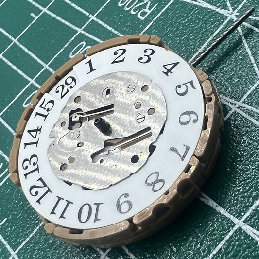 Close-up of wholesale Japan-made Miyota GP30 quartz watch movement for precise timekeeping