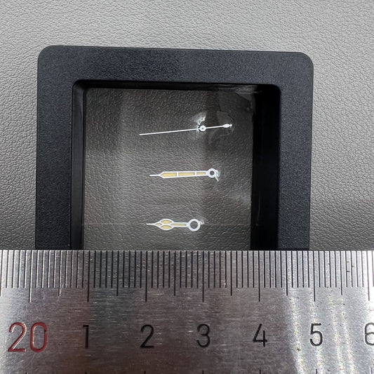 Orange painted watch hands with white trim and green lume, compatible with NH34/NH35/NH36/NH38 movements.