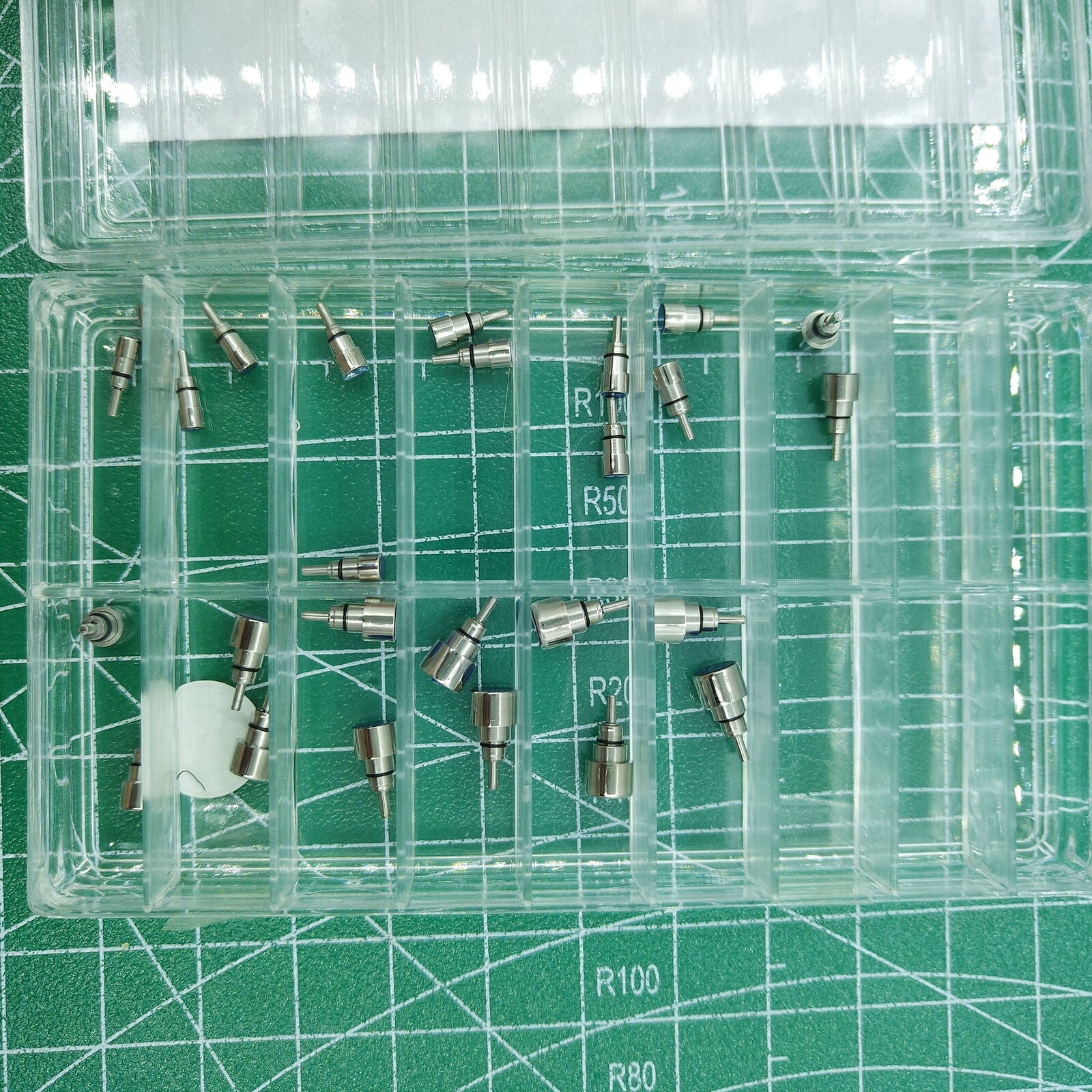 Set of 26 stainless steel chronograph button pushers for watch repair, screw-in type accessories.