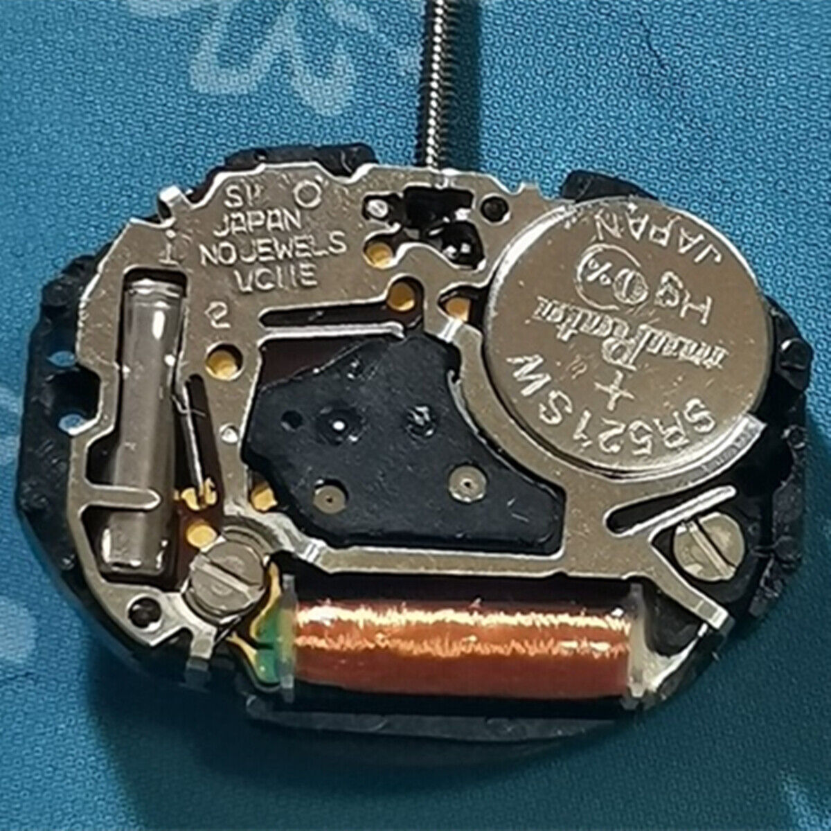 Hattori Epson VC11 quartz watch movement, precision Japan-made part for watch repair and accessories.