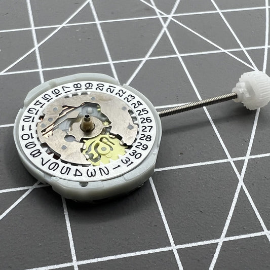 Sunon PE25 quartz watch movement with 3 hands and date window at 3 o'clock for replacements.